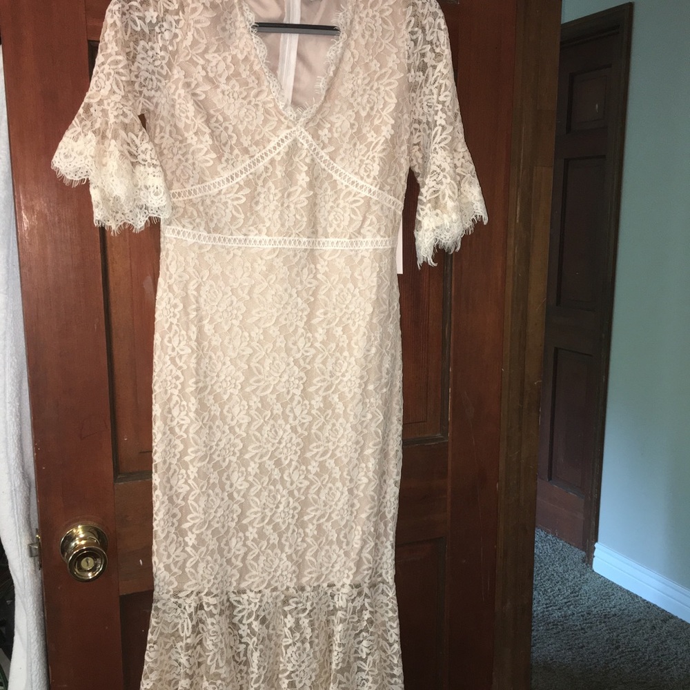 Beautiful NWT lace dress.